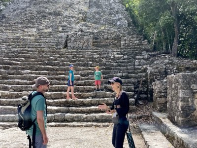 Kat explaining Maya history in front of a Coba structure