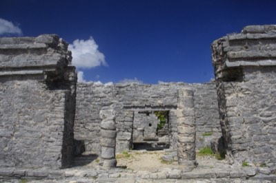 Tulum archaeological site with the turquoise sea behind it