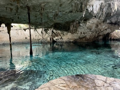 Crystal-clear water inside an underground cenote