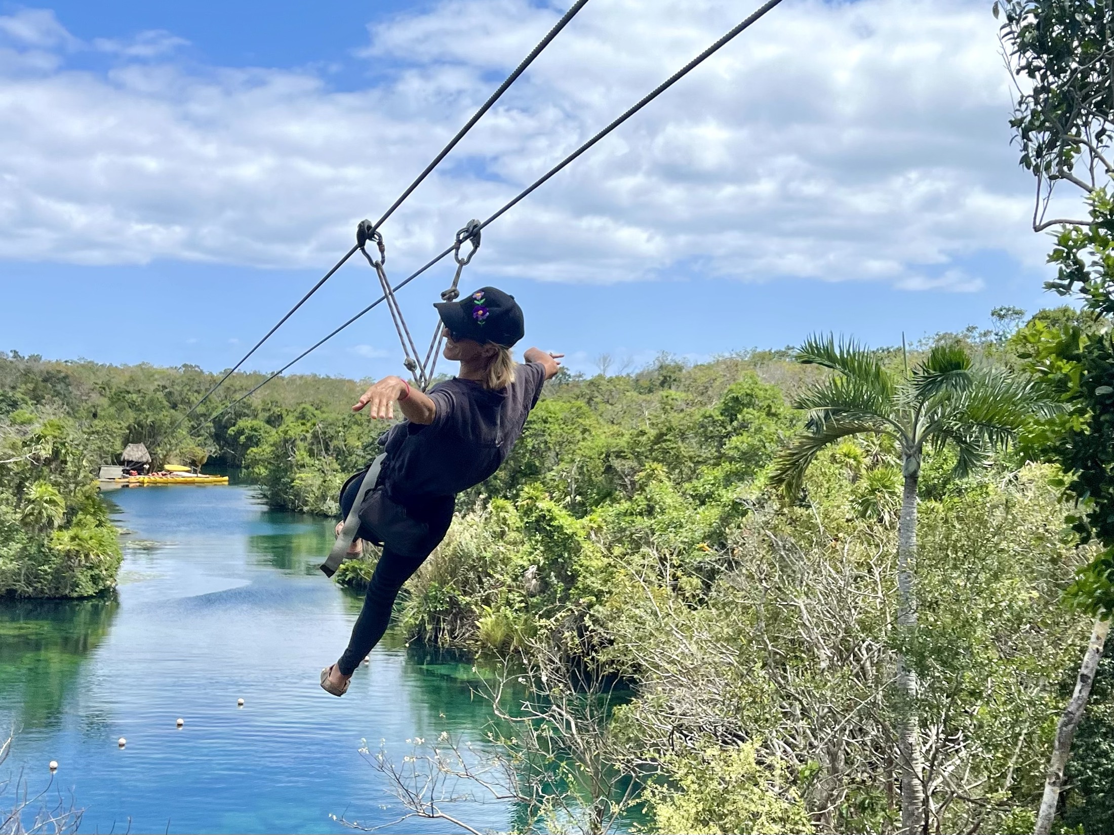 Kat getting guests ready for the jungle zip line