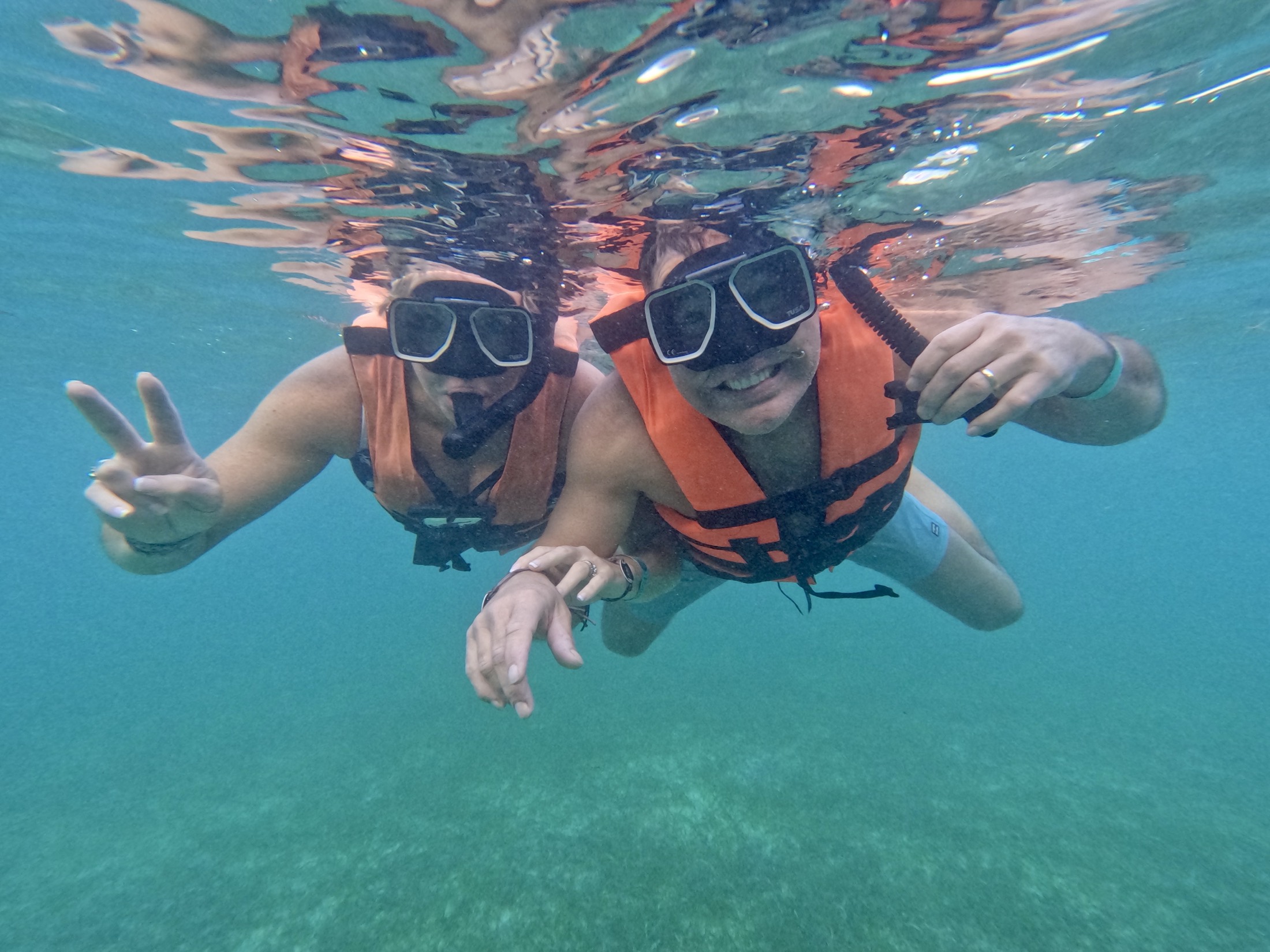 Guests snorkelling in the turquoise water of the Riviera Maya