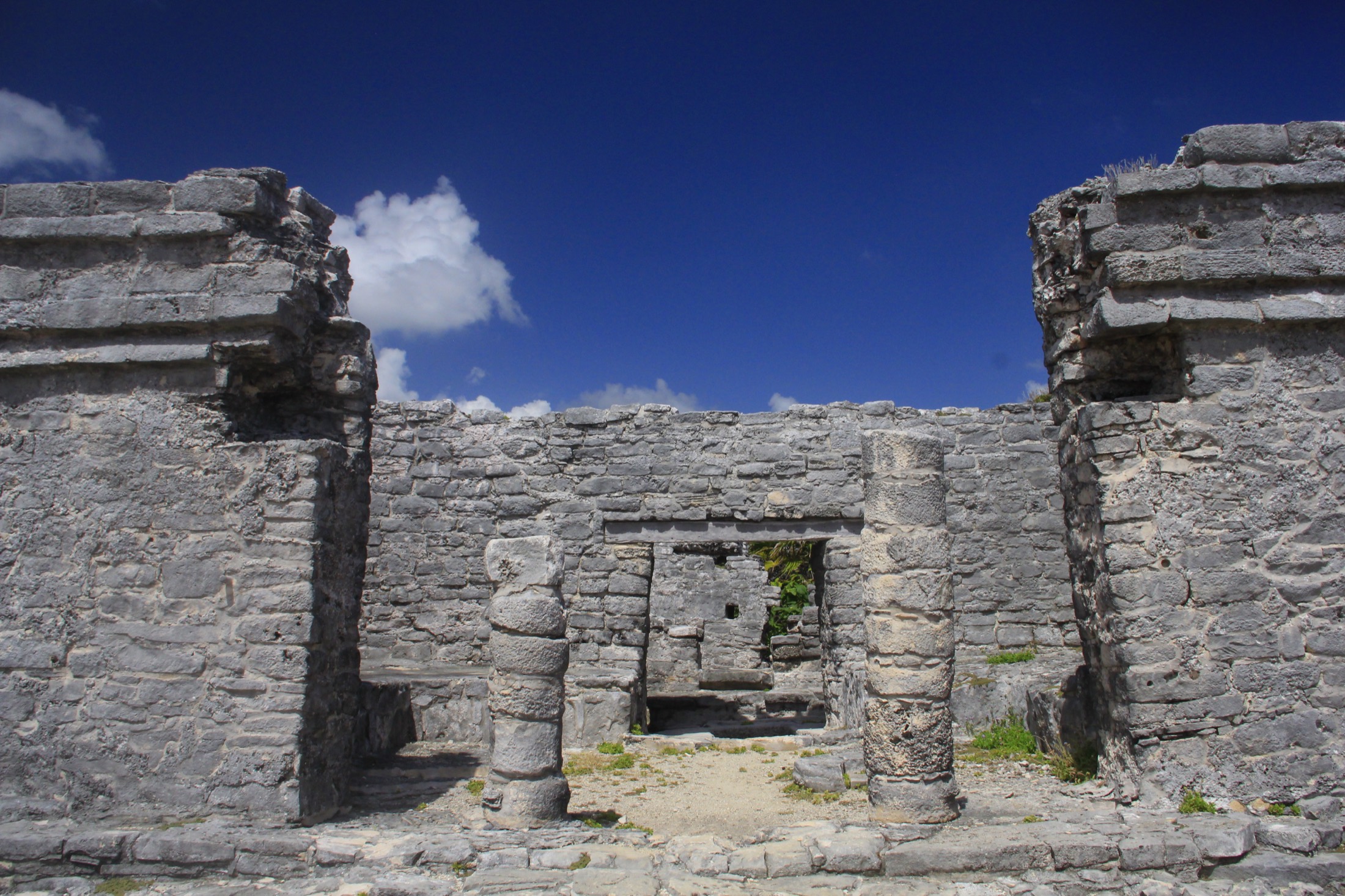 Tulum archaeological site with the turquoise sea behind it